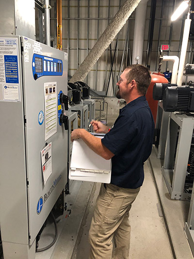 Man Inspecting Equipment